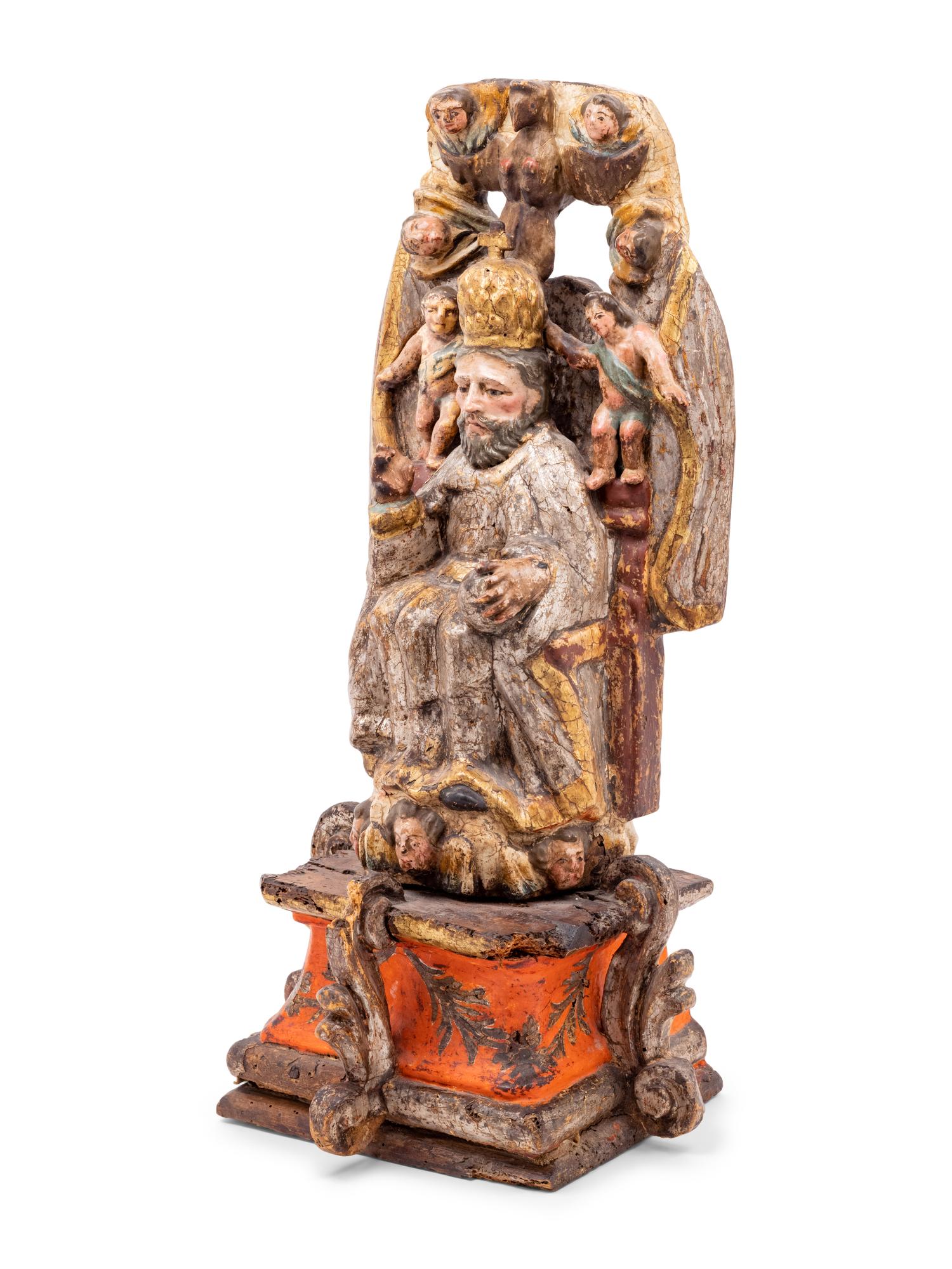 A Spanish Carved and Painted Wood Santos Group