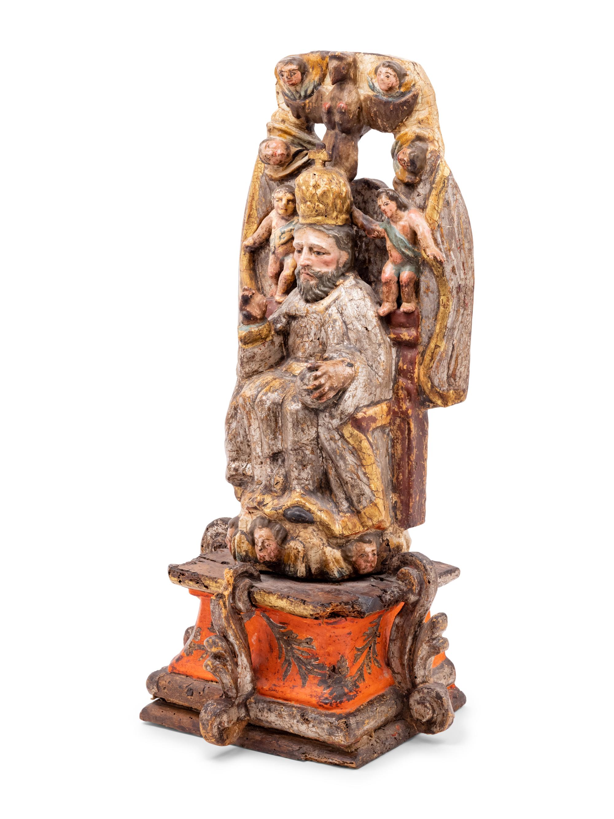 A Spanish Carved and Painted Wood Santos Group