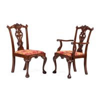 A Set of Eight Chippendale-Style Carved Mahogany Dining Chairs