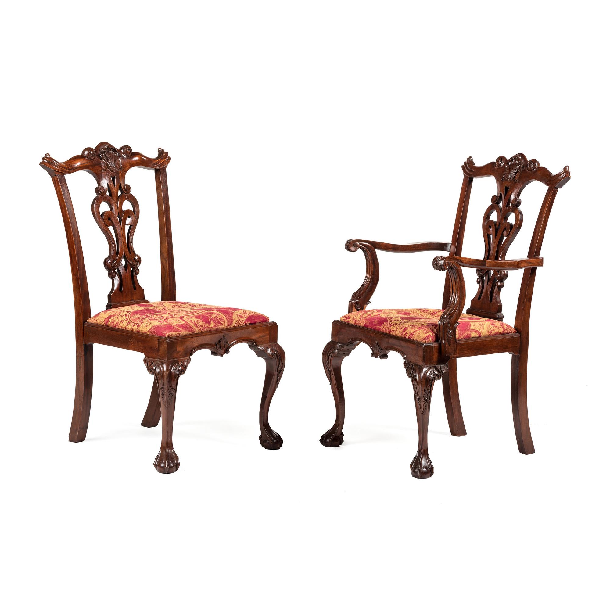 A Set of Eight Chippendale-Style Carved Mahogany Dining Chairs