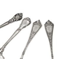 A Group of Four American Silver Flatware Serving Articles