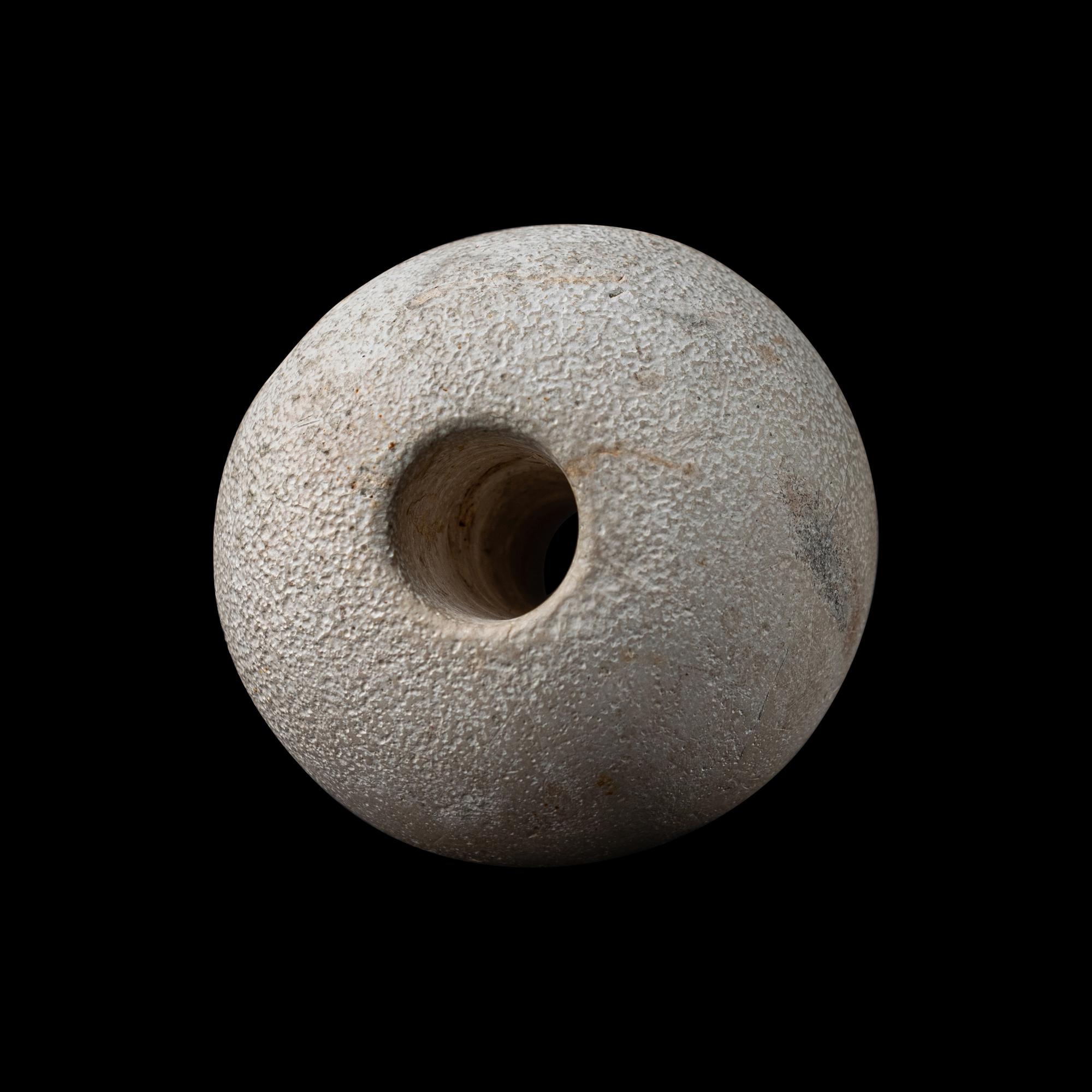 An Egyptian Limestone Mace Head