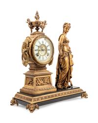An Ansonia Commerce Gilt Metal Figural Mantel Clock