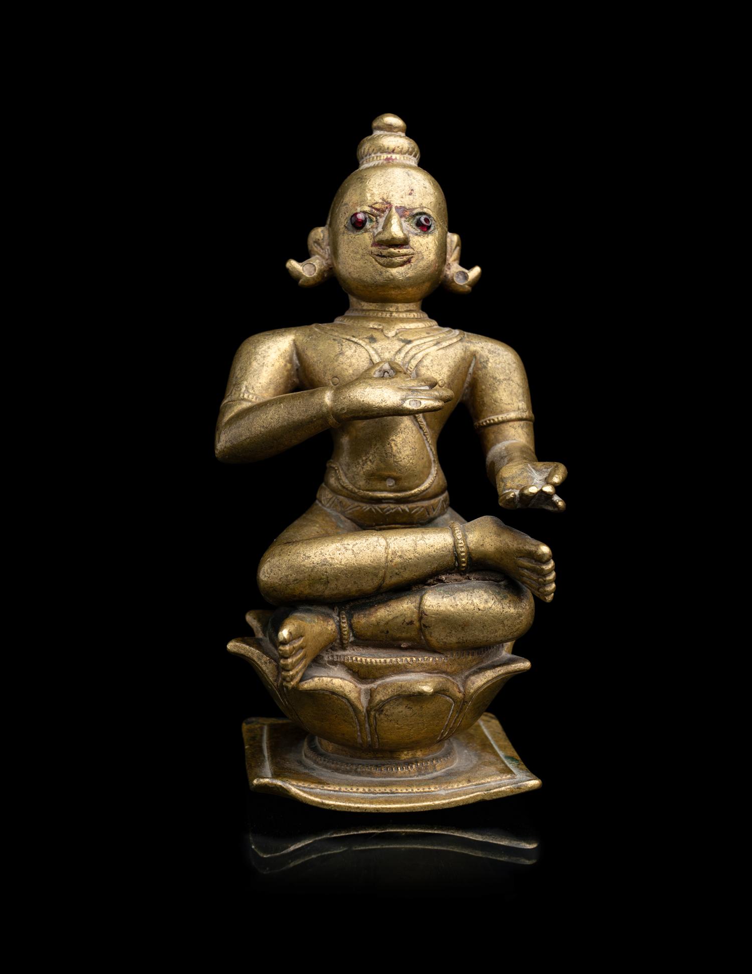 An Indian Orissa Bronze Figure of Seated Vishnu