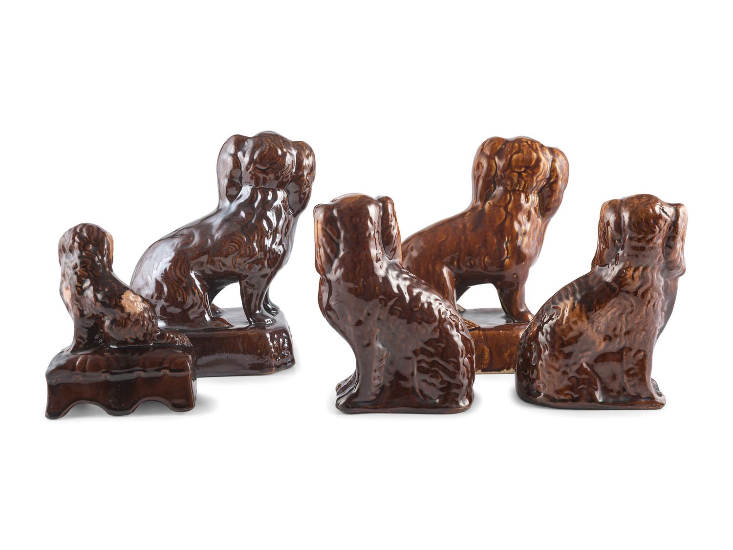 Five Rockingham Glaze Spaniel Figures