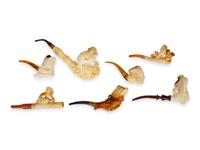 A Group of Seven Carved Meerschaum Pipes