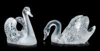 Two Lalique Swans on a Pond Length of largest 32 5/8 inches.