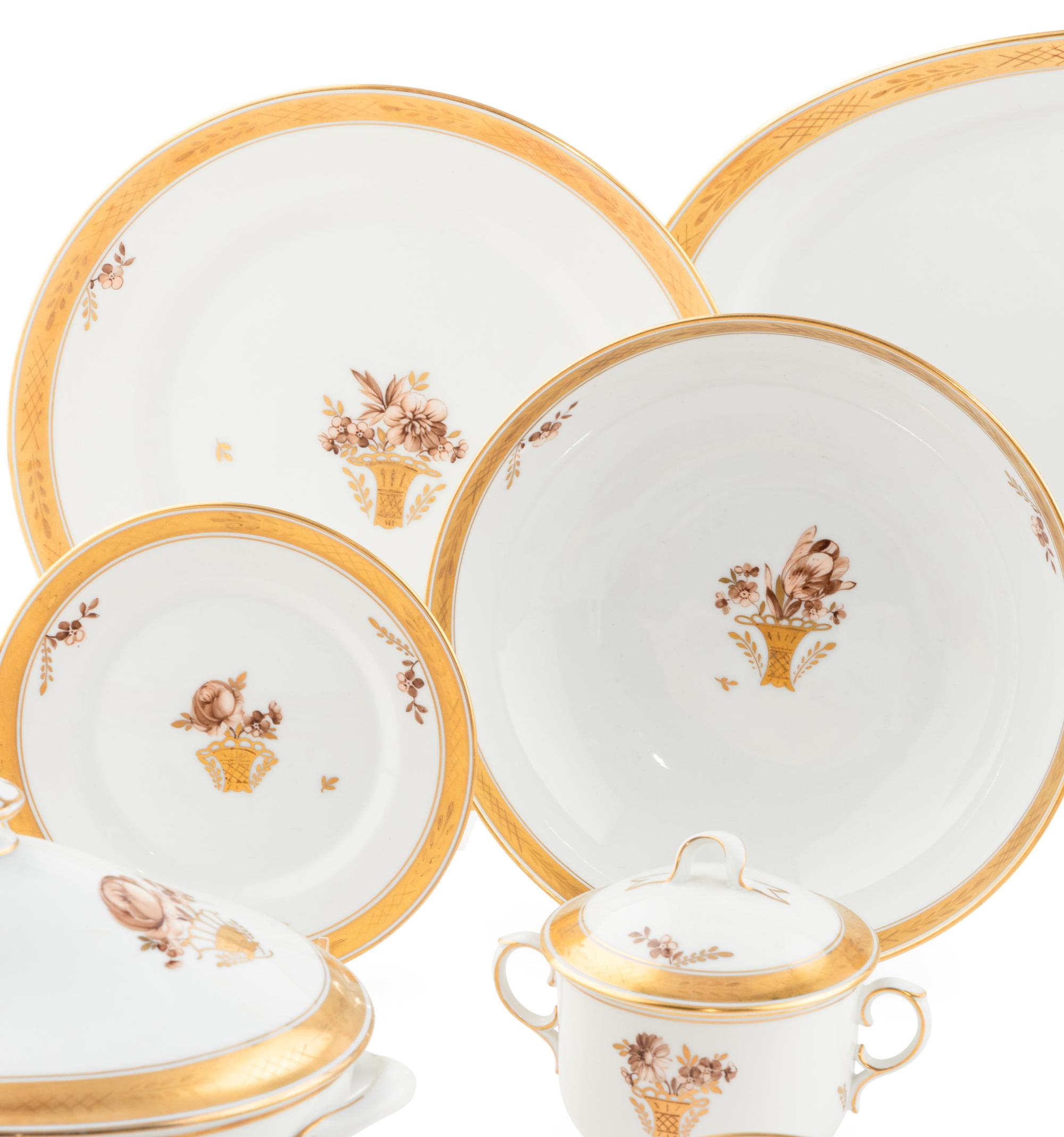 A Royal Copenhagen Golden Basket Porcelain Dinner Service