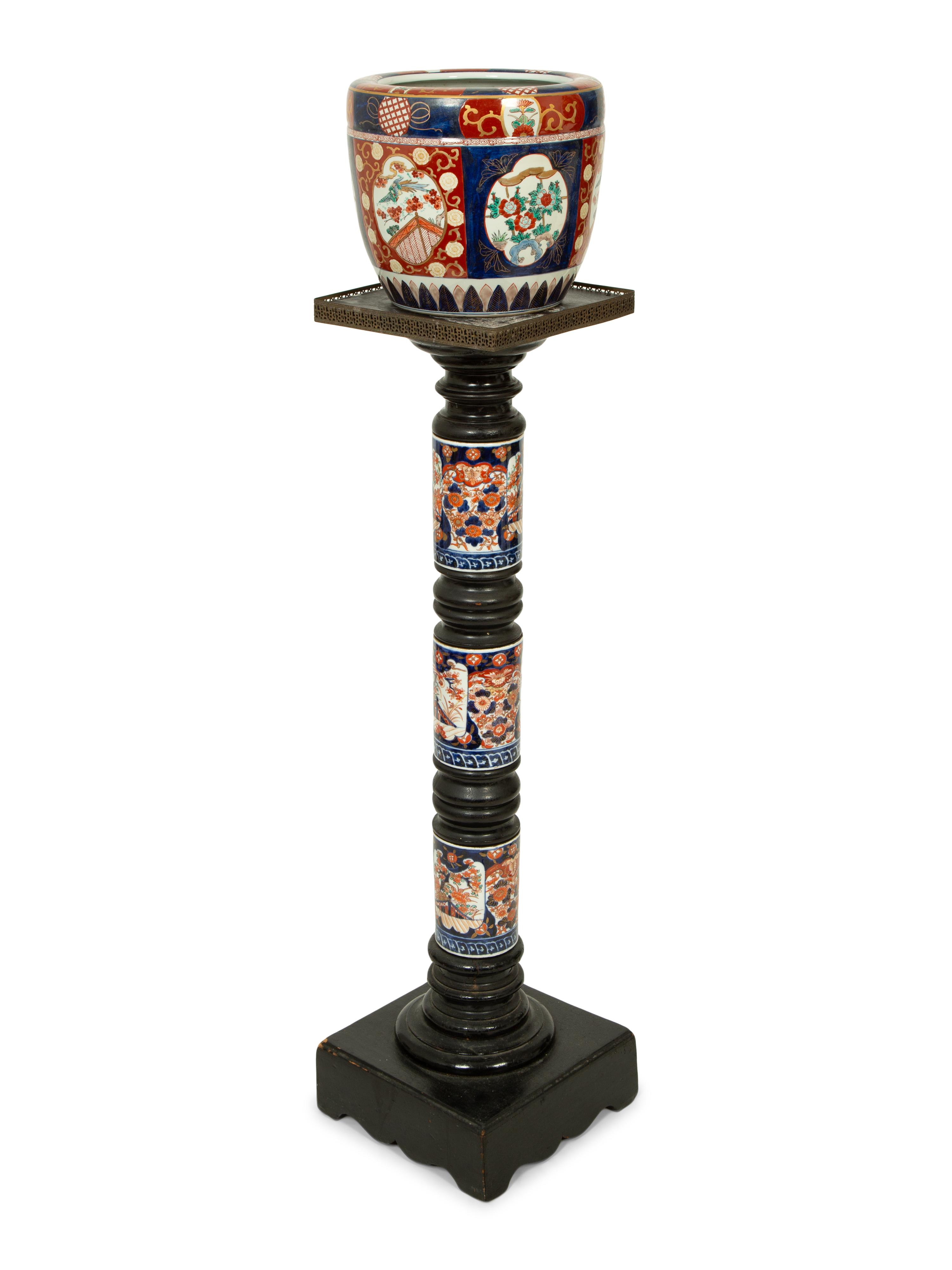 An Imari Porcelain Jardiniere on an Ebonized Pedestal with Imari Porcelain Mounts — 19TH/20TH CENTURY