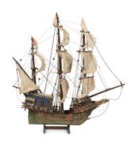 An Italian Painted and Parcel Gilt Model of a Galleon with Painted Cotton Sails