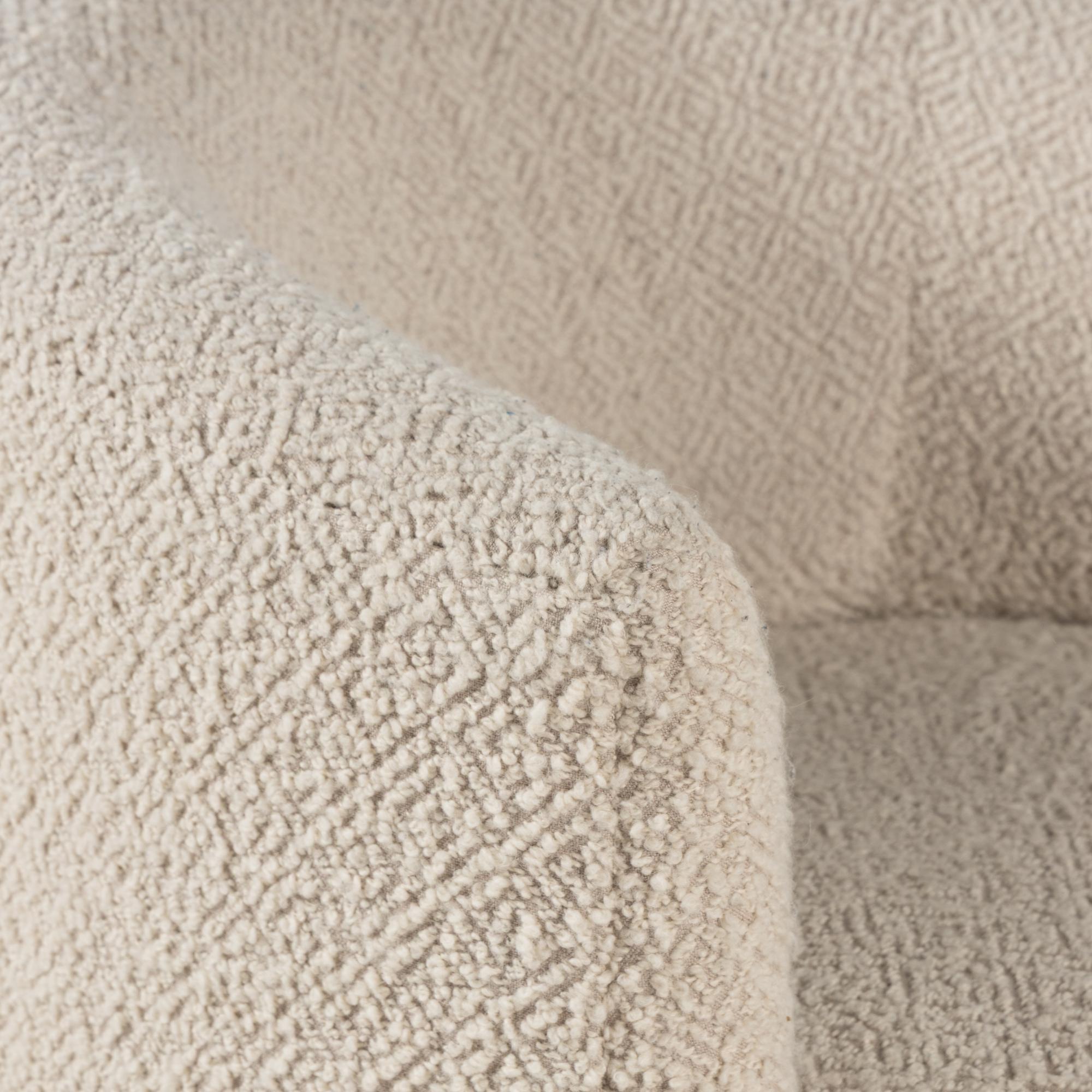 A Pair of Custom Barrel Back Swivel Chairs with Bouclé Upholstery