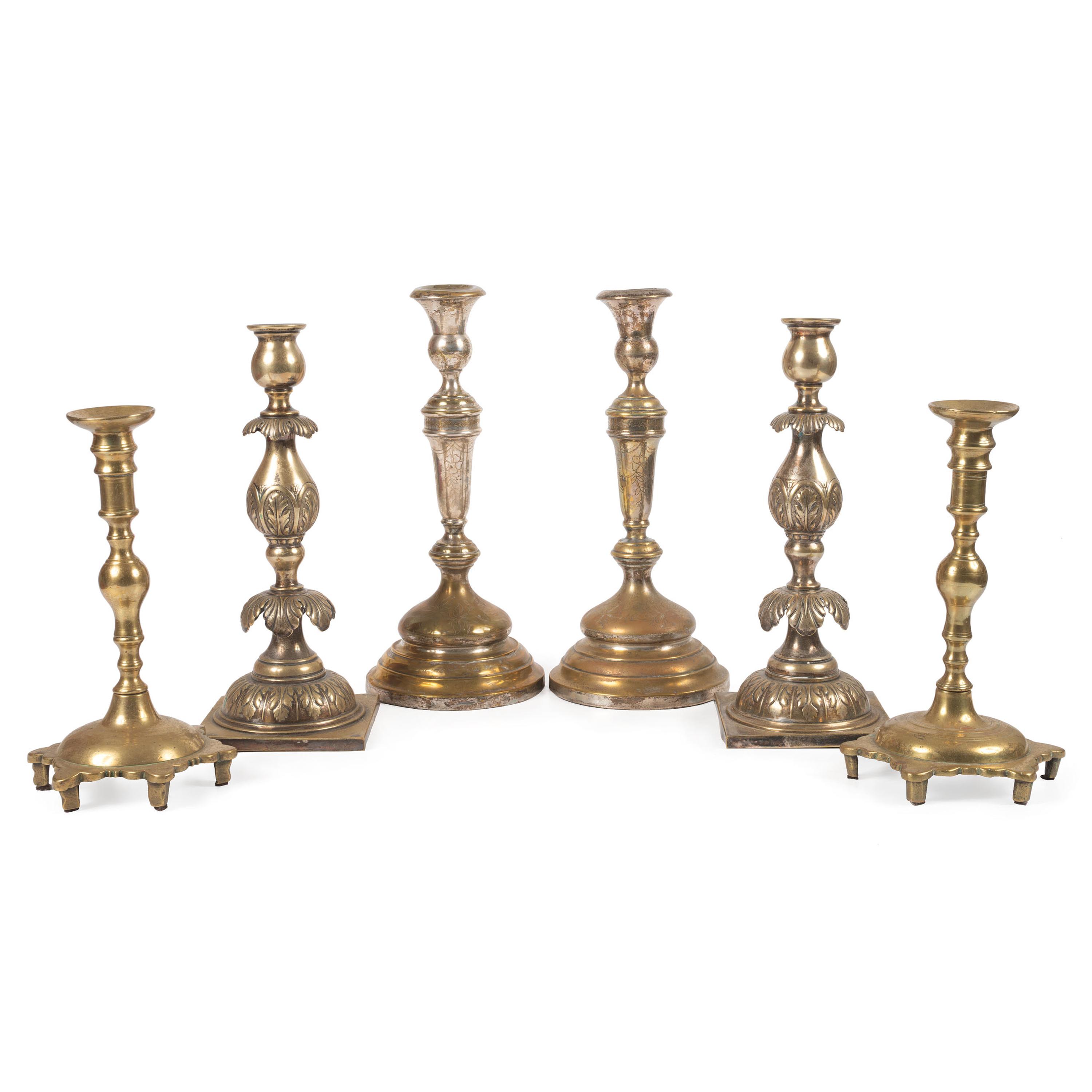 A Group of Continental Brass and Silverplated Candlesticks