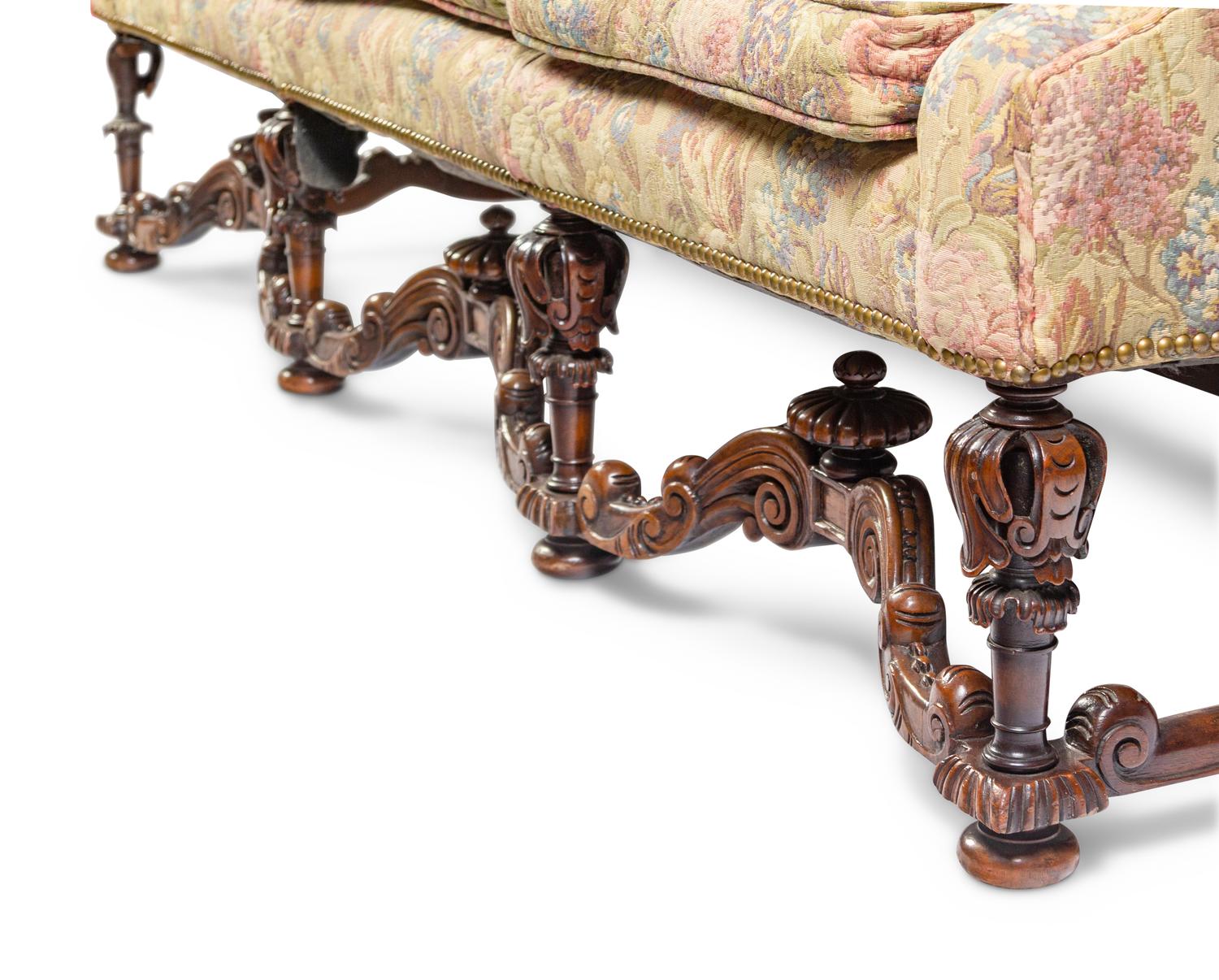A William and Mary Style Carved Walnut Sofa