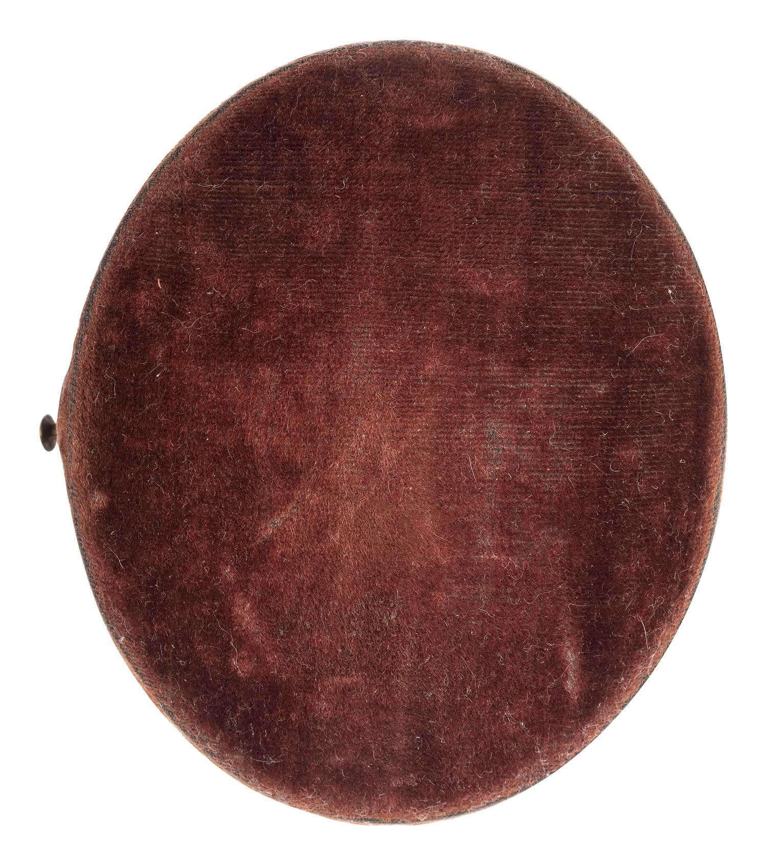 [AFRICAN AMERICANA] -- [CIVIL WAR]. Oval tintype of an African American soldier.