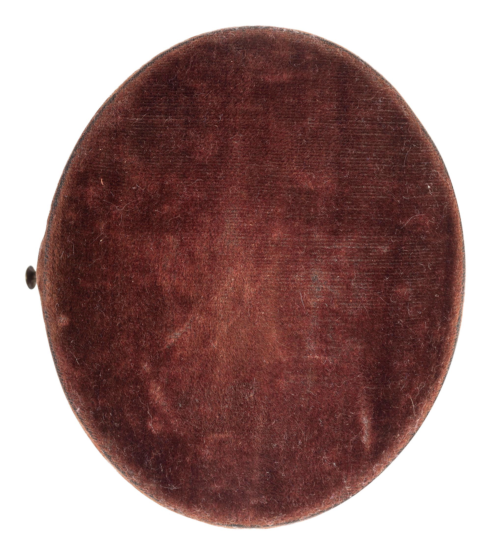 [AFRICAN AMERICANA] -- [CIVIL WAR]. Oval tintype of an African American soldier.