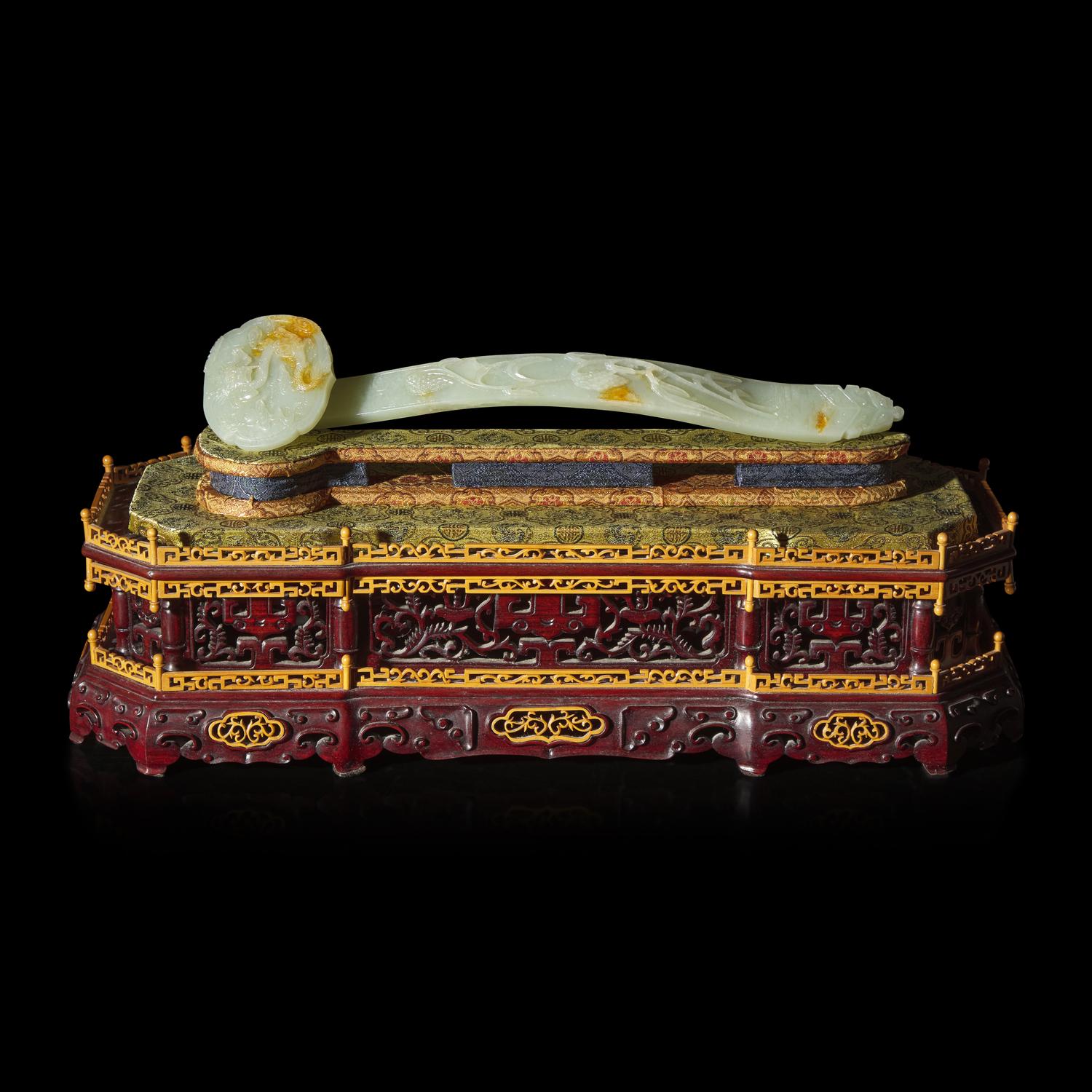 A Chinese Celadon and Russet Jade Ruyi Scepter, 20th Century 近代 青玉如意配匣