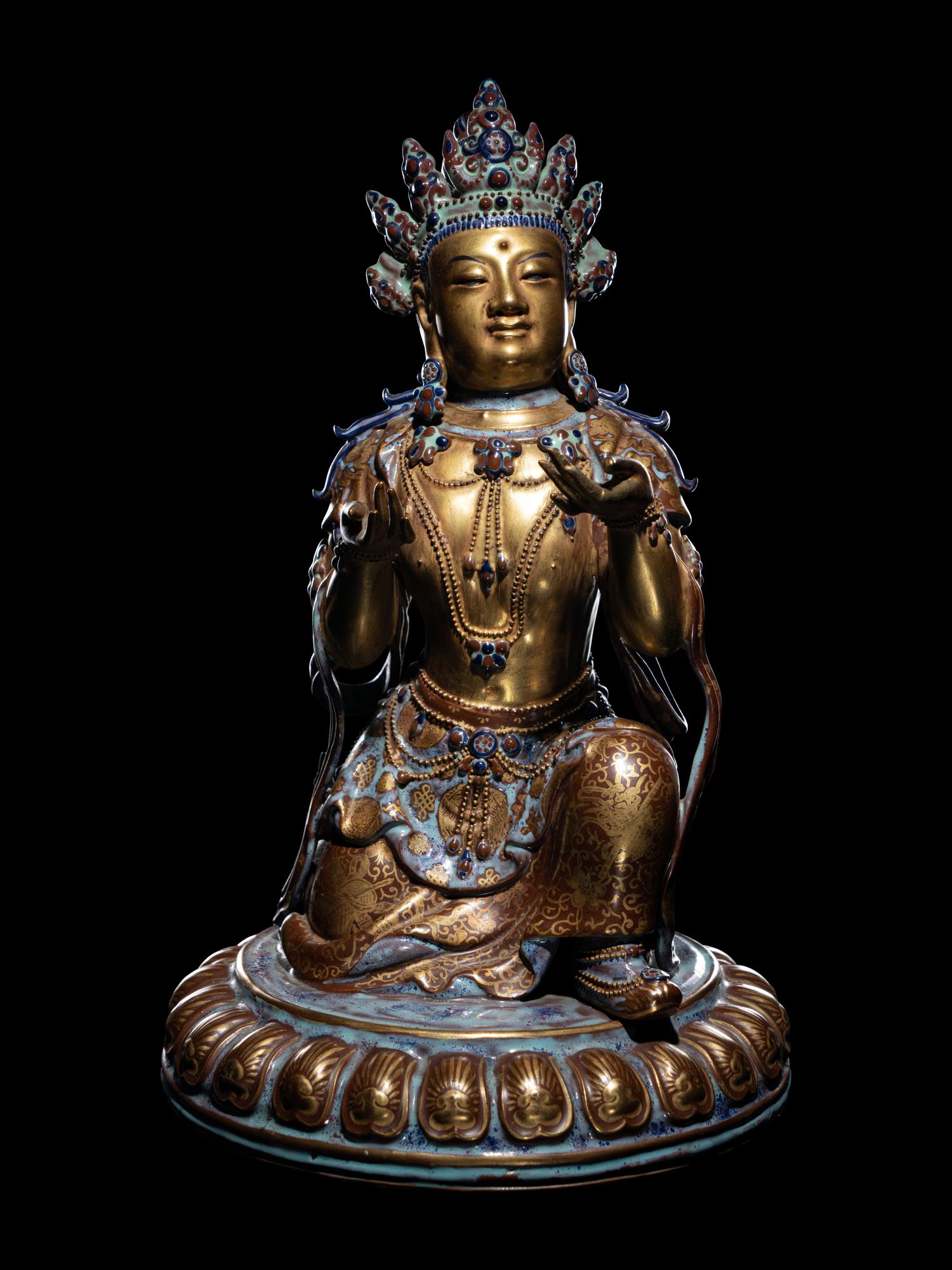 A Gilt Decorated Robin's Egg Glazed Porcelain Figure of Guanyin