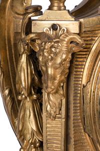 A Louis XVI Gilt Bronze Cartel Clock