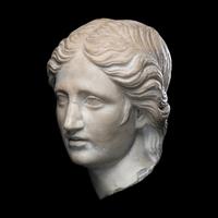 A Roman Marble Head of a Goddess or Youthful God