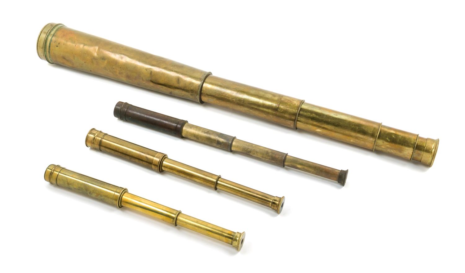 A Group of Four Brass Body Hand Telescopes Length of longest 14 1/2 inches (when collapsed).