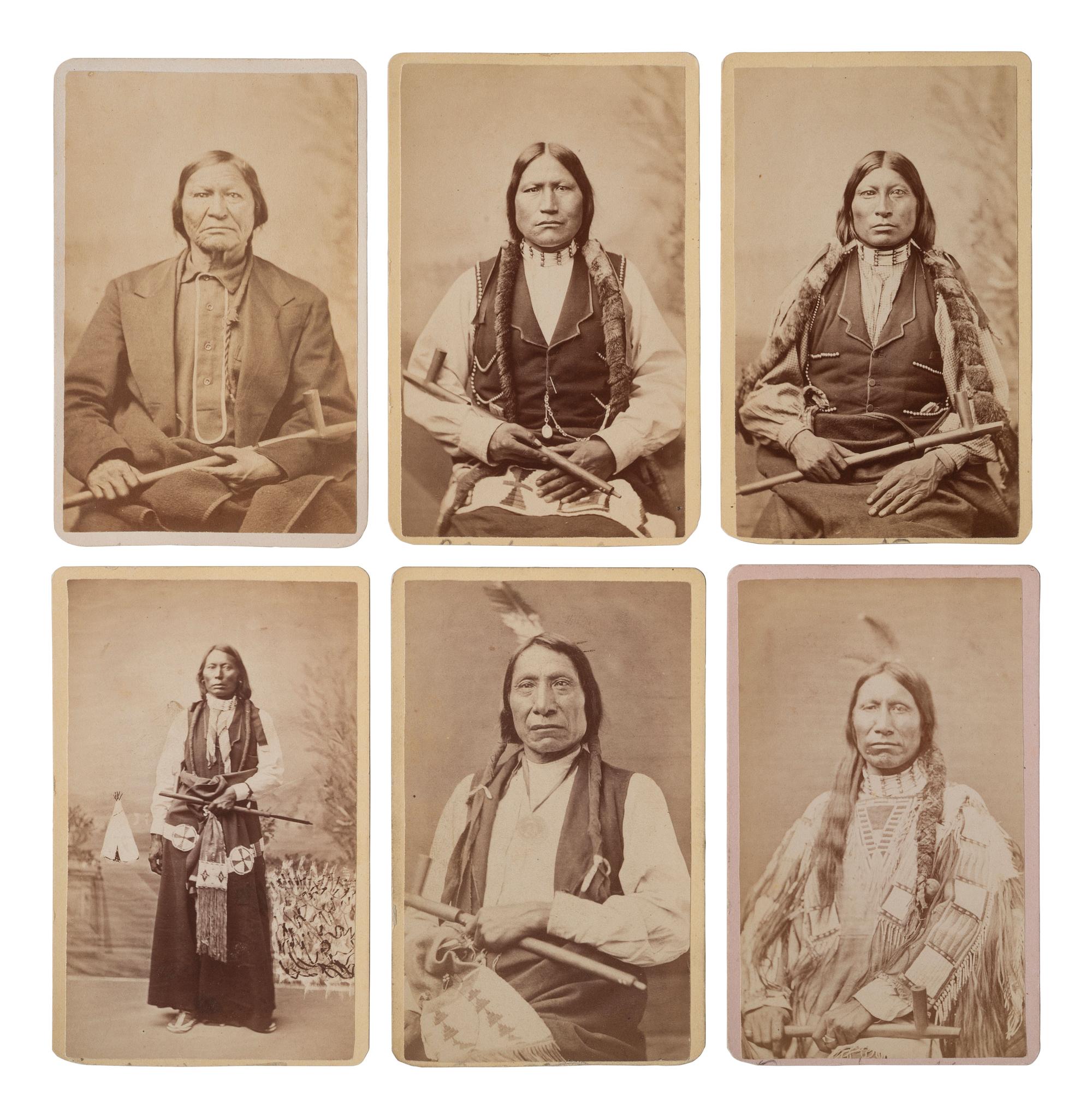 MITCHELL, Daniel S. (1838-1929), photographer. A group of 24 CDVs of Sioux chiefs and warriors at Red Cloud Agency. Cheyenne, WY, ca 1877.