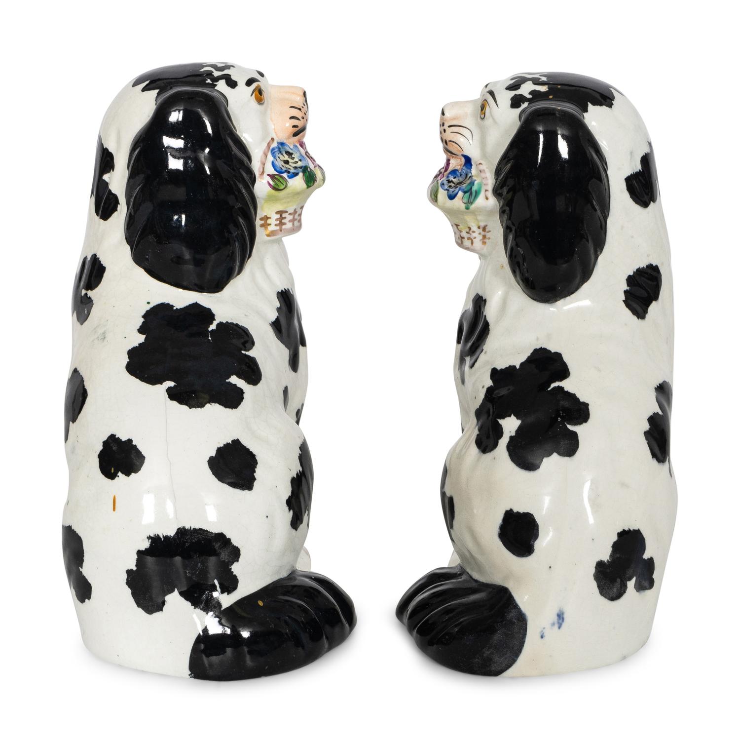 A Pair of Staffordshire Pottery Disraeli Spaniels with Floral Baskets