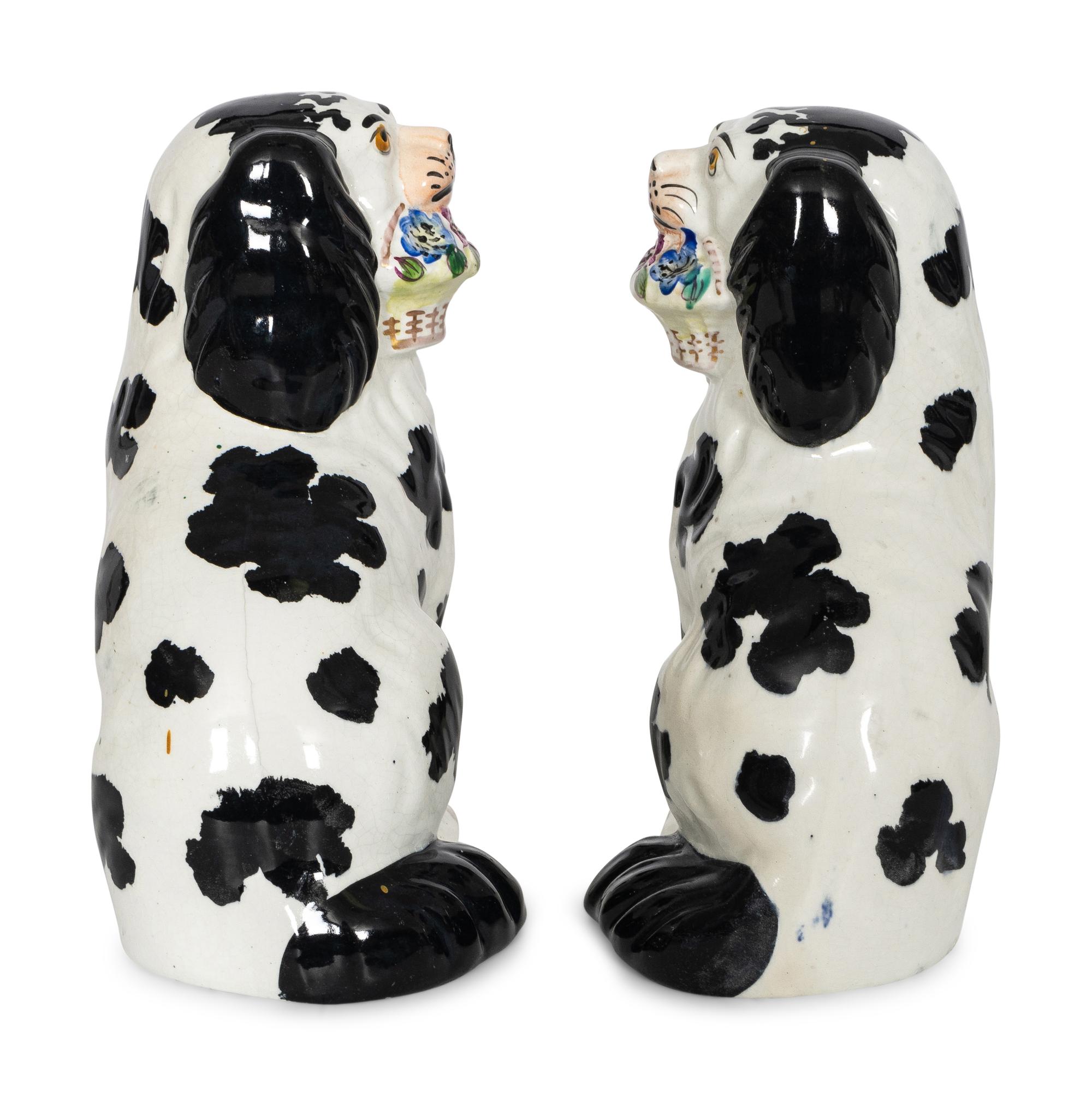 A Pair of Staffordshire Pottery Disraeli Spaniels with Floral Baskets