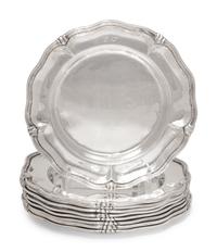 A Set of Nine Silver Bread Plates