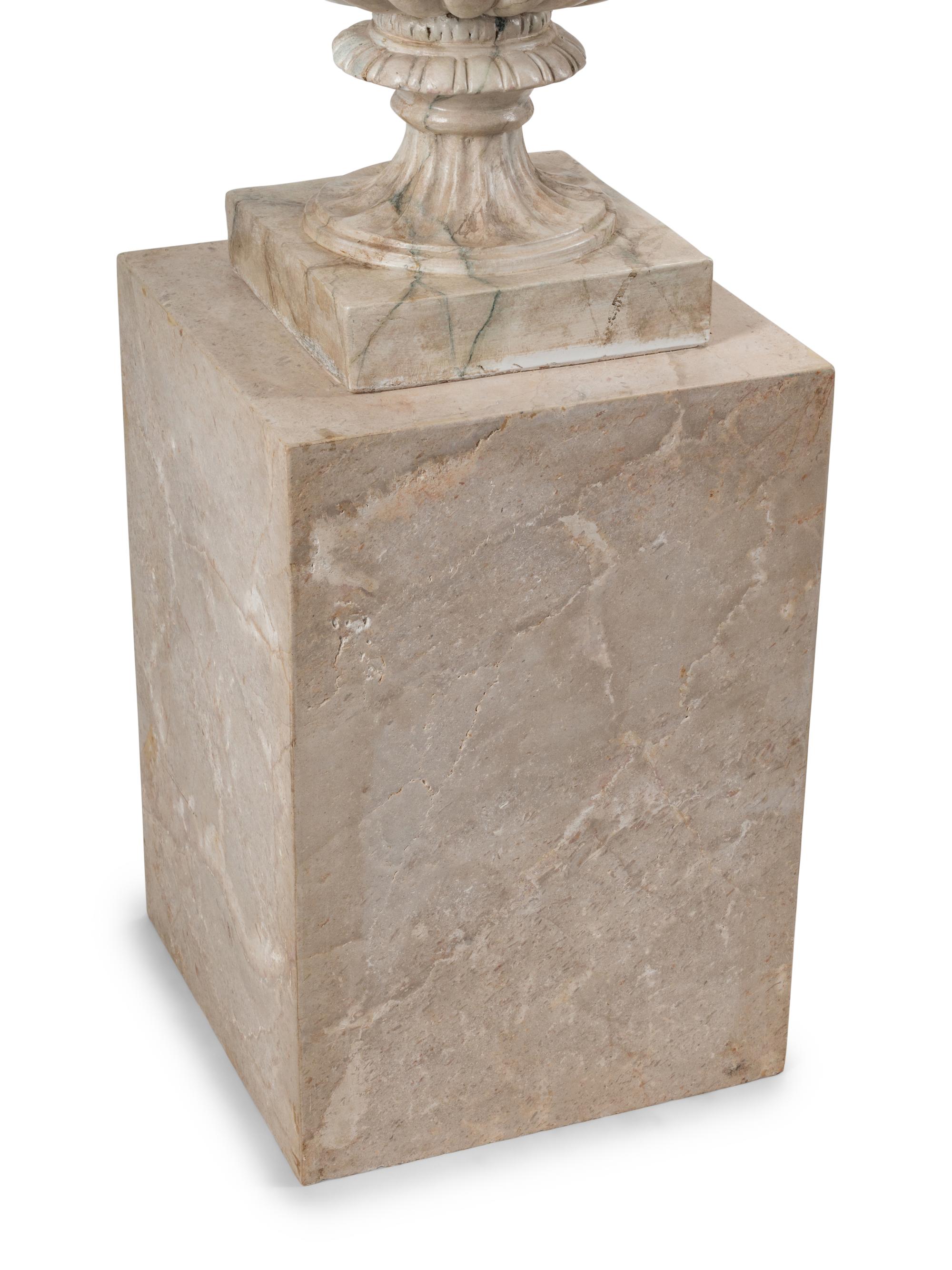 A Pair of Neoclassical Style Faux Marble Painted Terracotta Urns and Stone Plinths