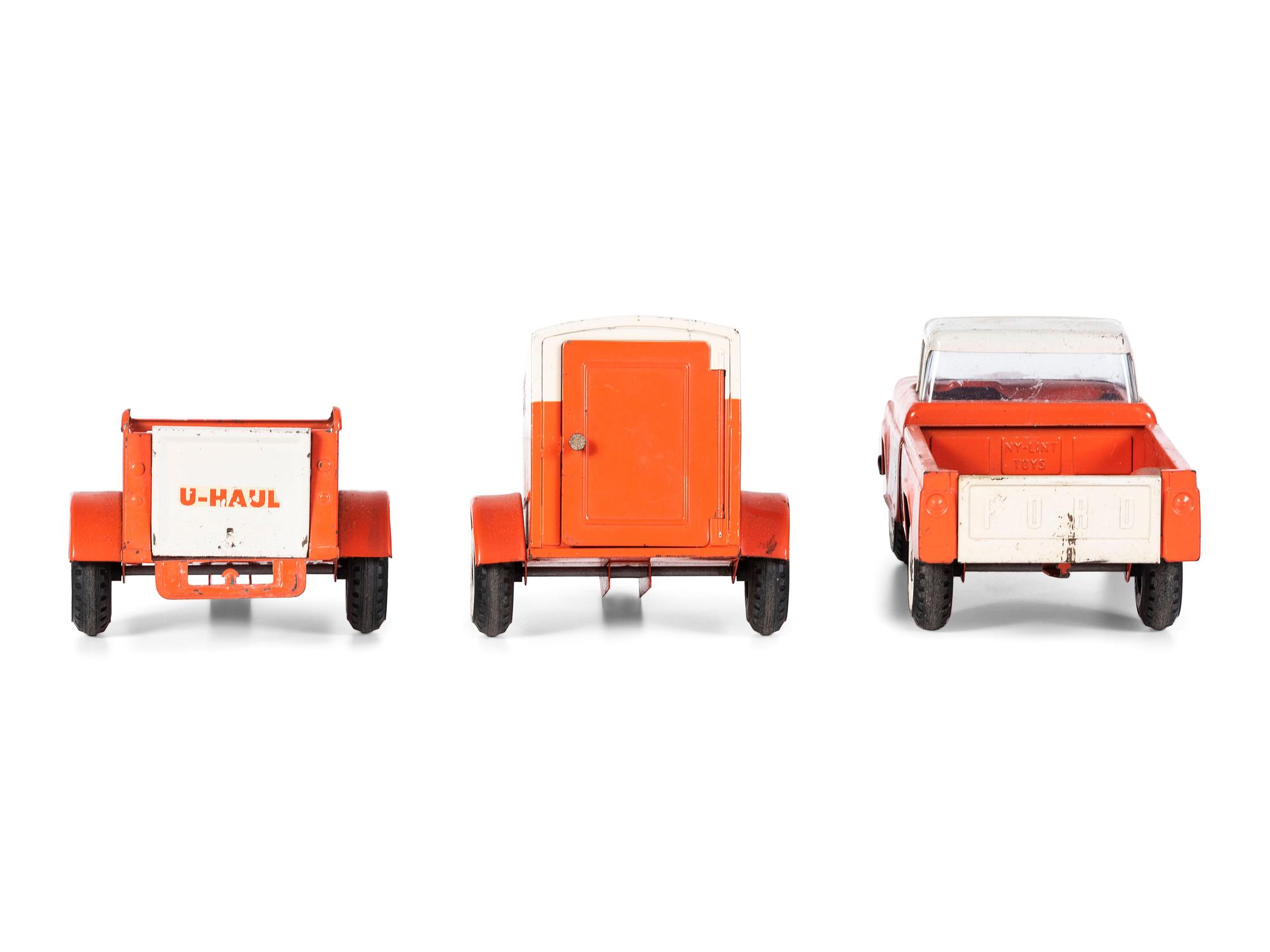 A Nylint 'U-Haul' Three Piece Toy Set