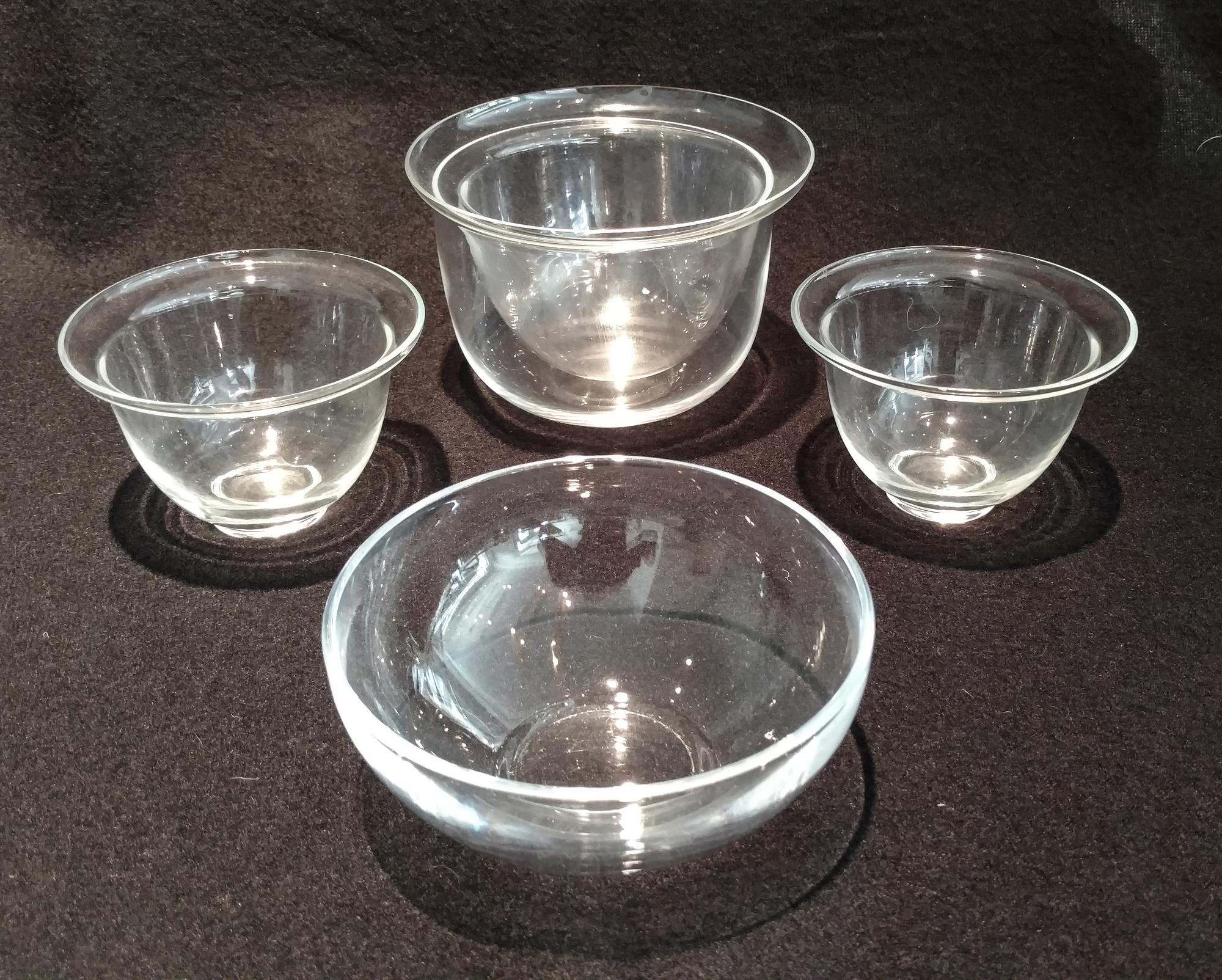 A Collection of Wine Rinsers Diameter of first 6 inches.