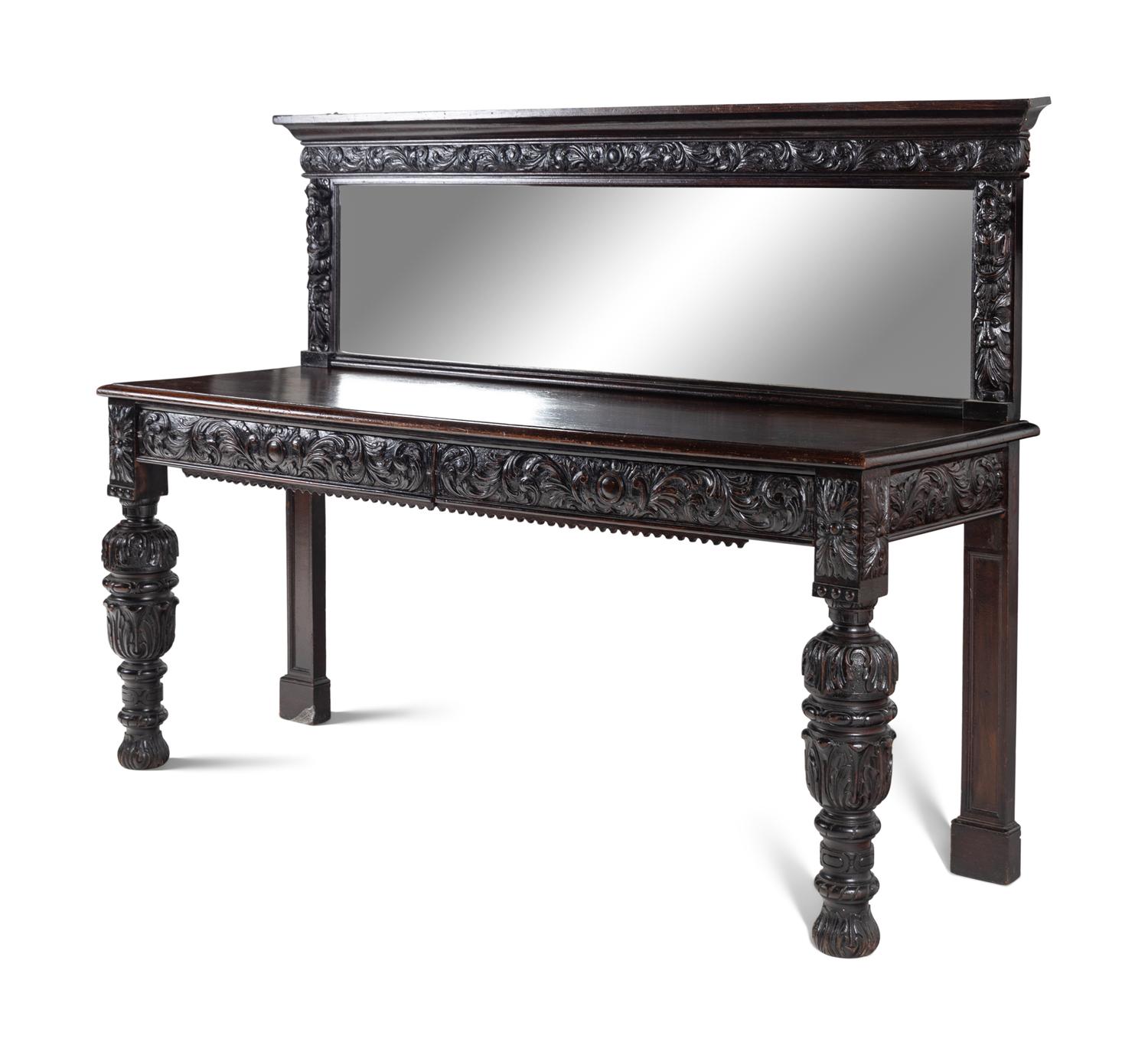 A Jacobean Style Carved Oak Sideboard and Mirror