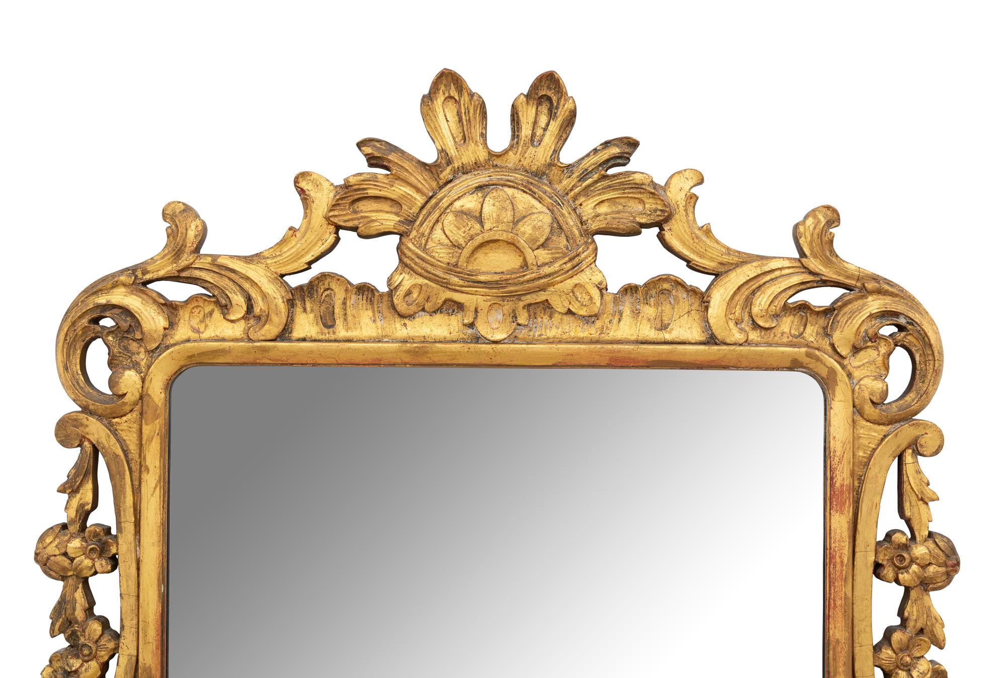 An Italian Carved Giltwood Mirror