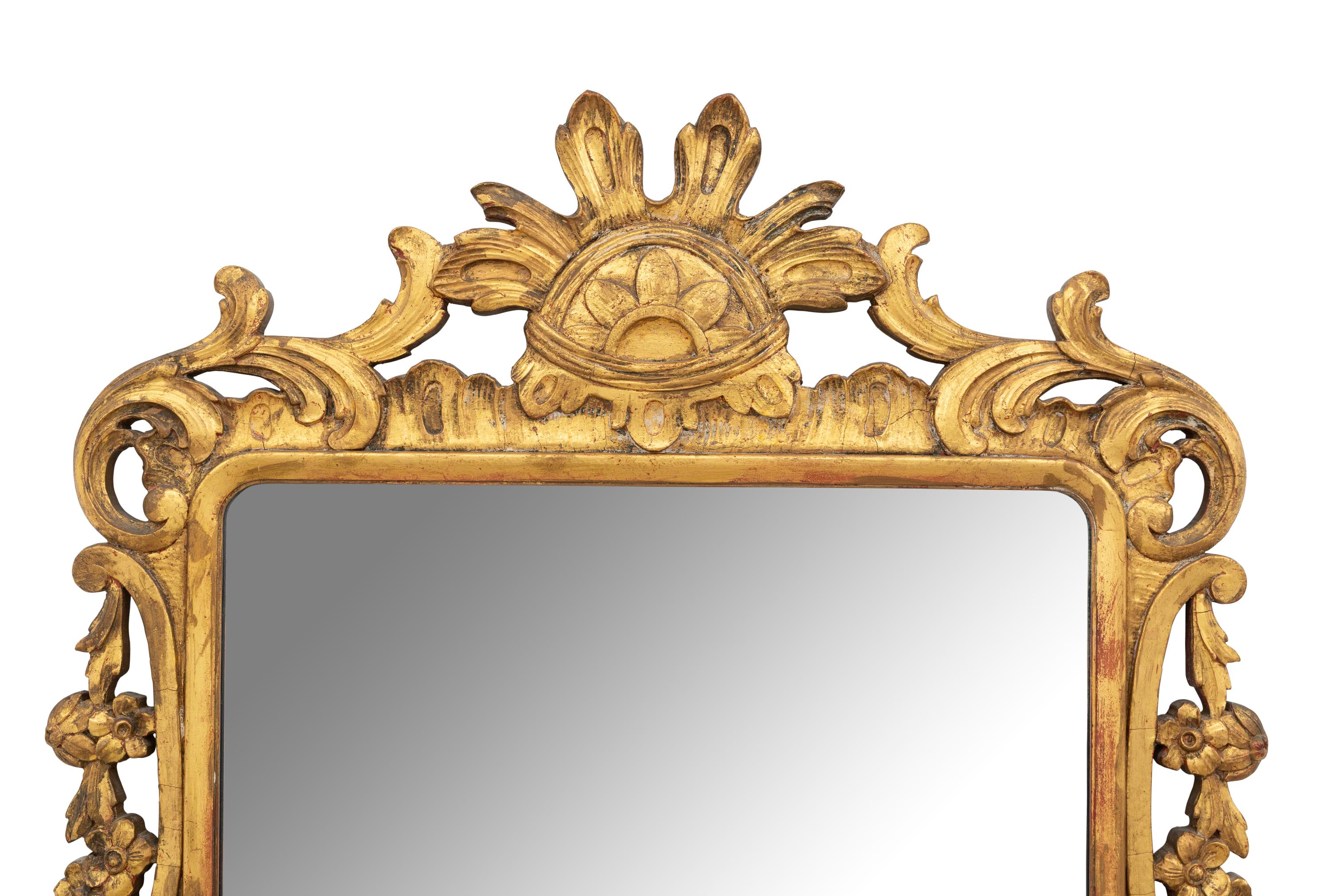 An Italian Carved Giltwood Mirror