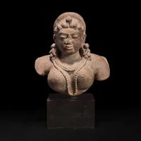An Indian carved stone bust of a female deity 印度石雕女性神像 12th Century or earlier ???????