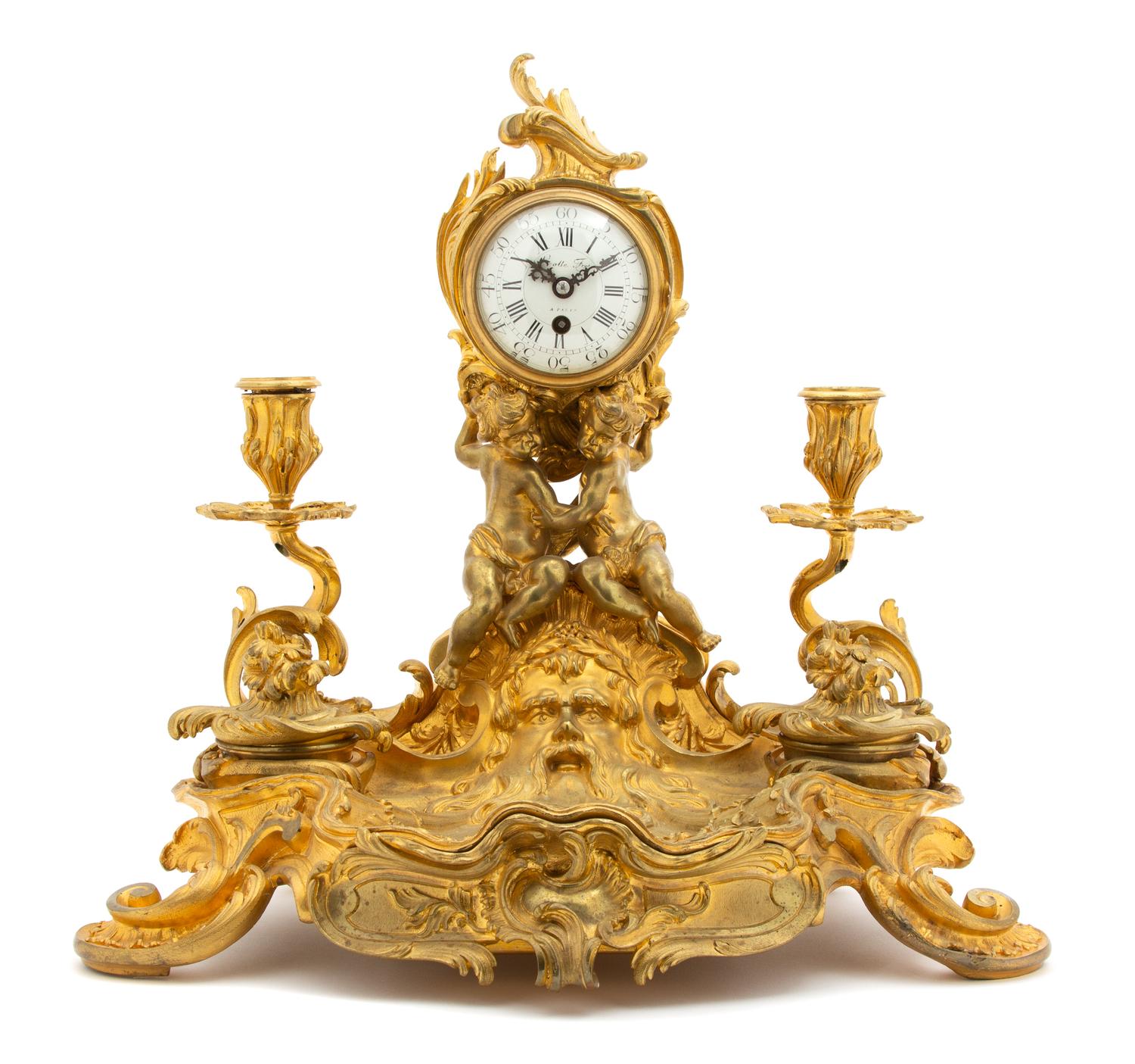 A Louis XV Style Gilt-Bronze Clock-Mounted Encrier Height 14 3/4 x width 16 1/2 inches — 19TH CENTURY