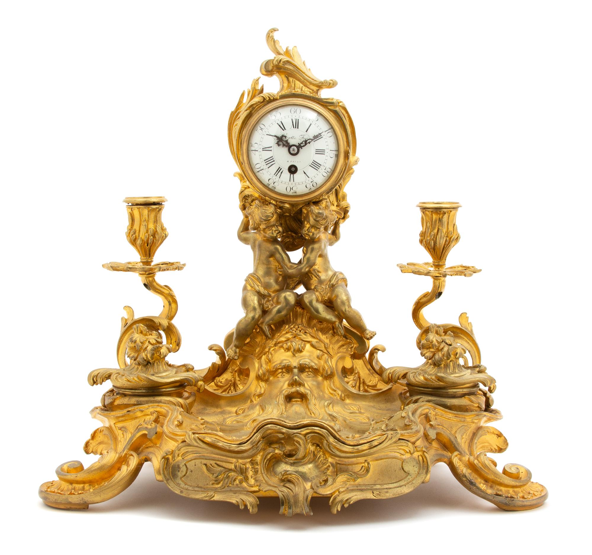 A Louis XV Style Gilt-Bronze Clock-Mounted Encrier Height 14 3/4 x width 16 1/2 inches — 19TH CENTURY