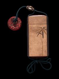 A Japanese Gold Decorated Wood Single-Case Inro