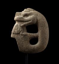 A Veracruz Stone Hacha in the Form of a Serpent Eating a Bird