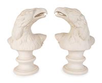 A Pair of Molded Composition Eagle Heads — 20TH CENTURY