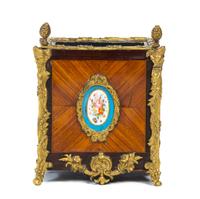 A Napoleon III Gilt Bronze and Porcelain Mounted Fruitwood Cache Pot Height 9 3/4 inches.