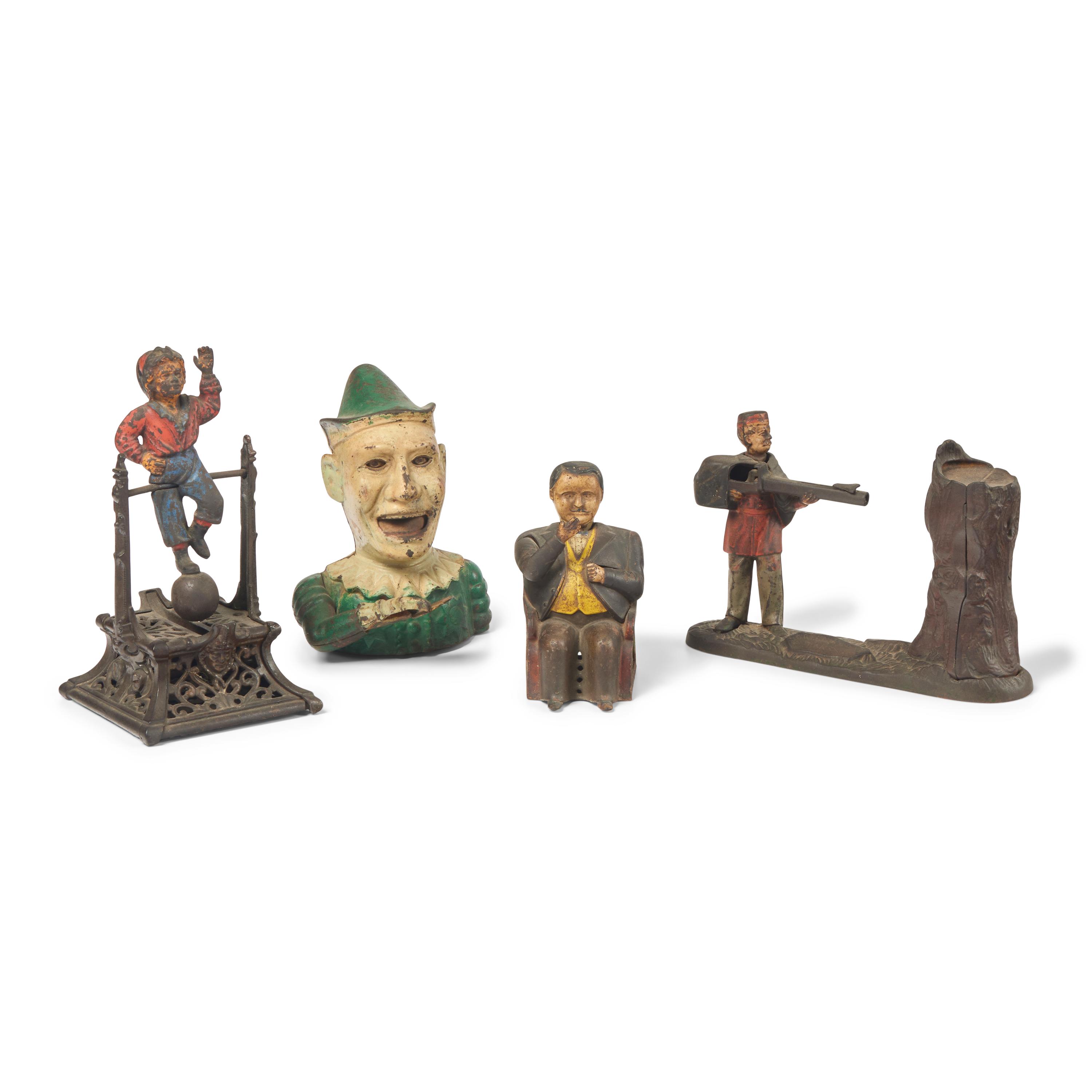 A Group of Four Figural Cast Iron Banks