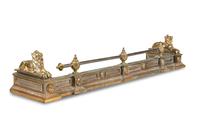 An Empire Style Brass and Steel Fire Fender with Recumbent Lions