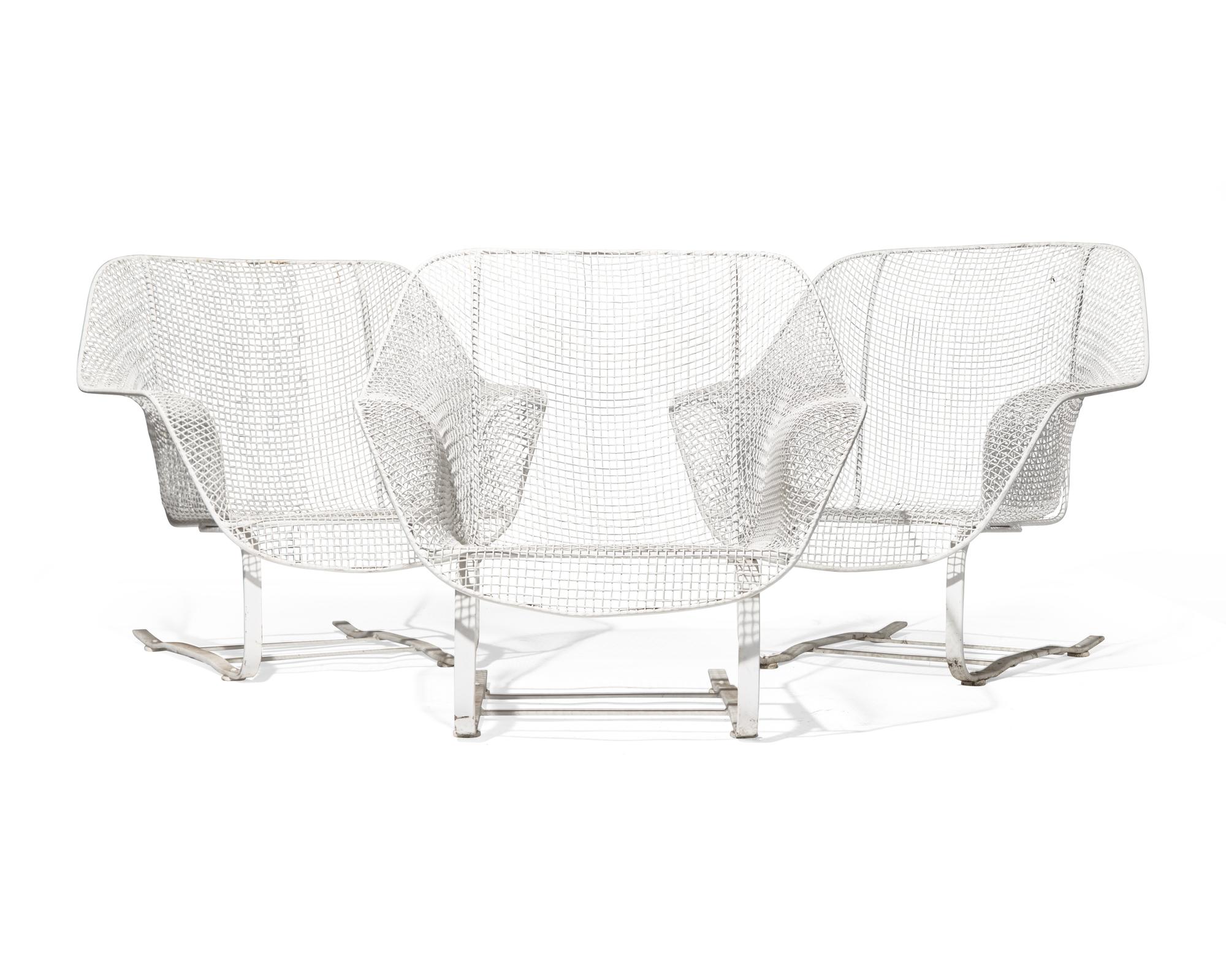 Three Lounge Chairs