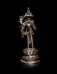 A Nepalese Parcel-Gilt Bronze Figure of Standing Avalokiteshvara