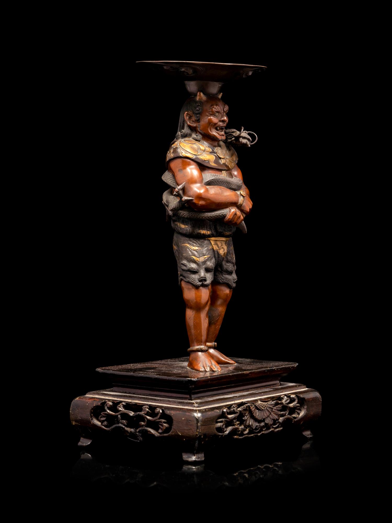 A Patinated and Gilt Bronze Figure of Oni