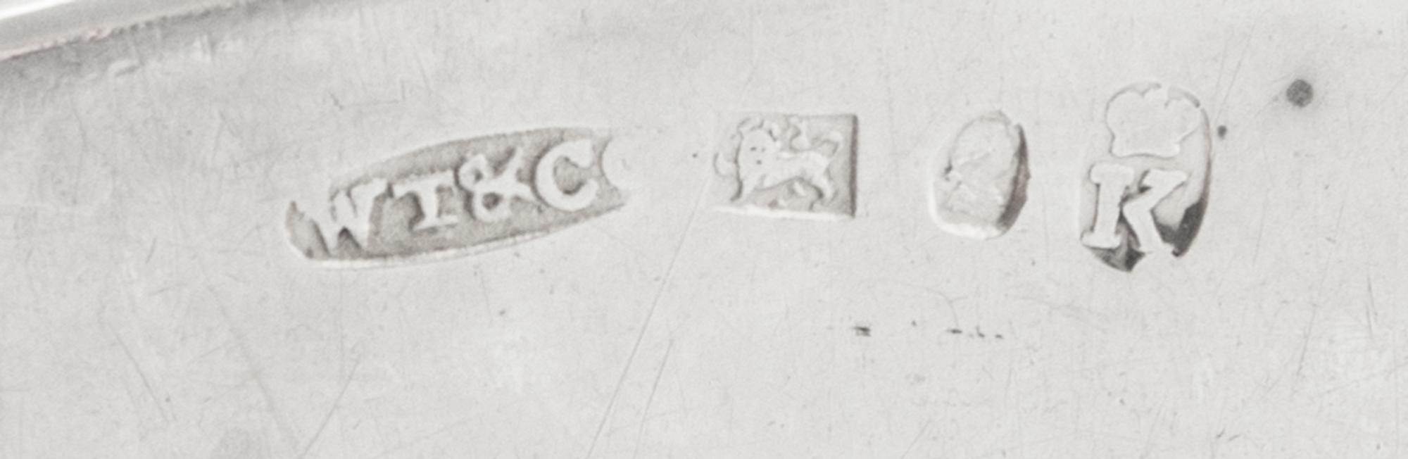 A George III Silver Bread Tray, W. Tucker & Co., Sheffield, 1809, of rectangular form with rounded corners, the gadroon rim worked to s