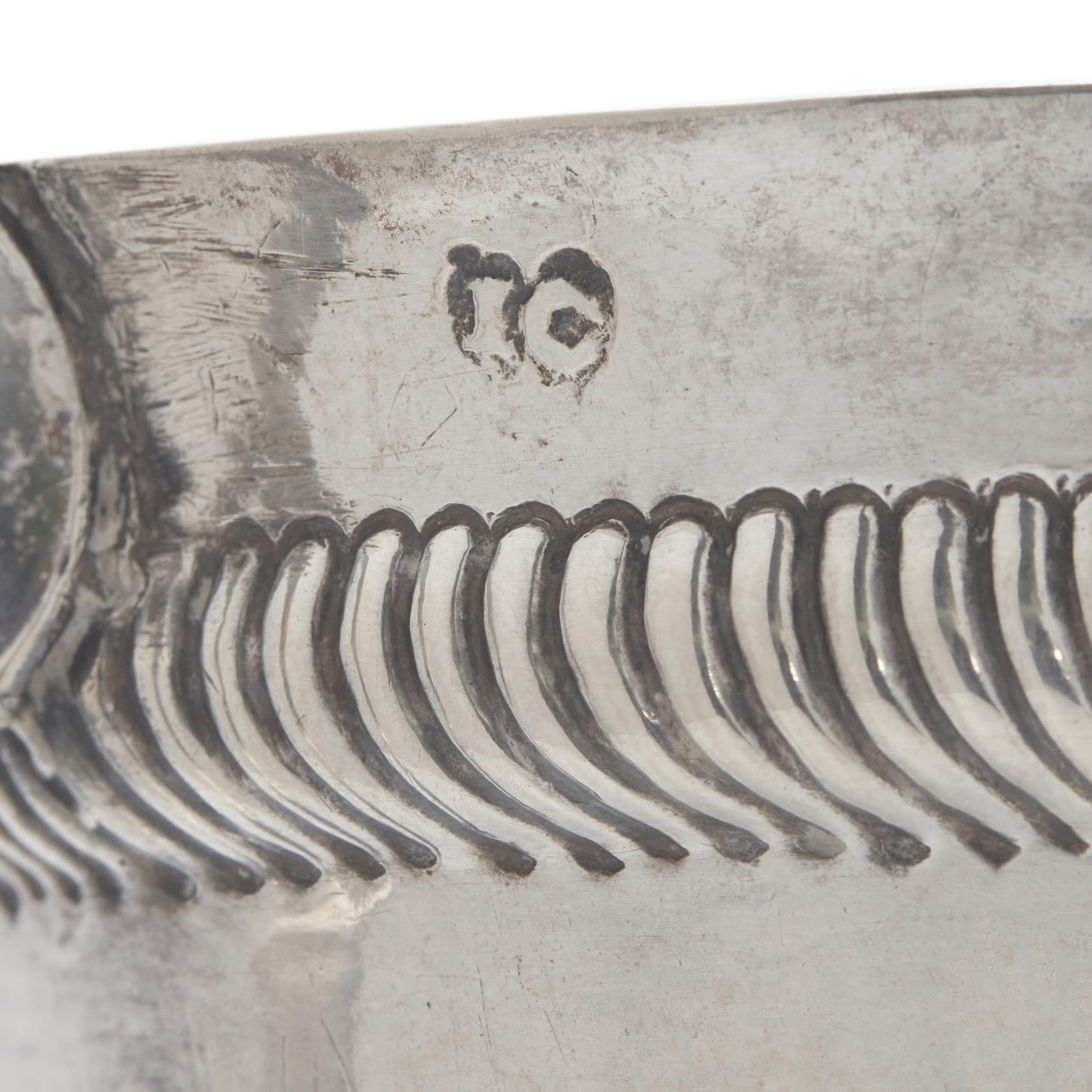 A Silver Caudle Cup