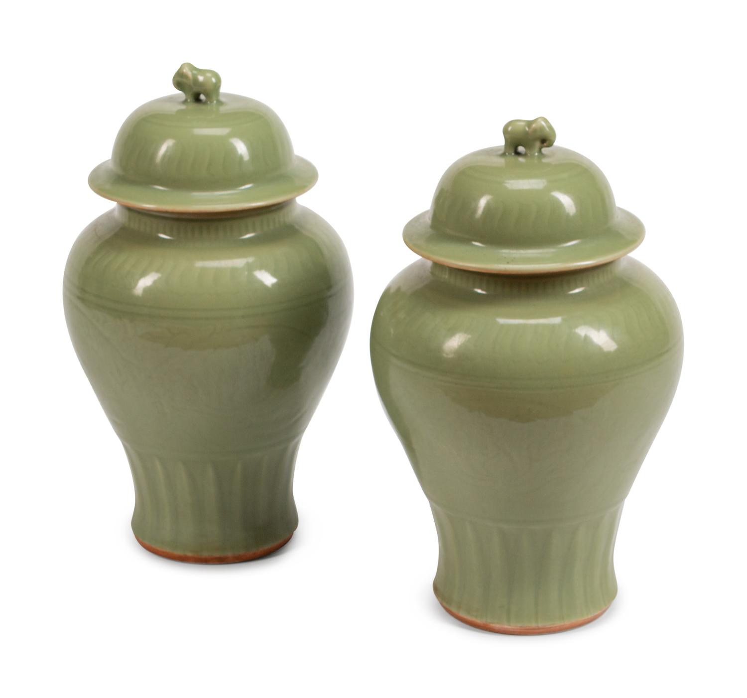 A Pair of Chinese Celadon-Glazed Porcelain Meiping Vases and Covers