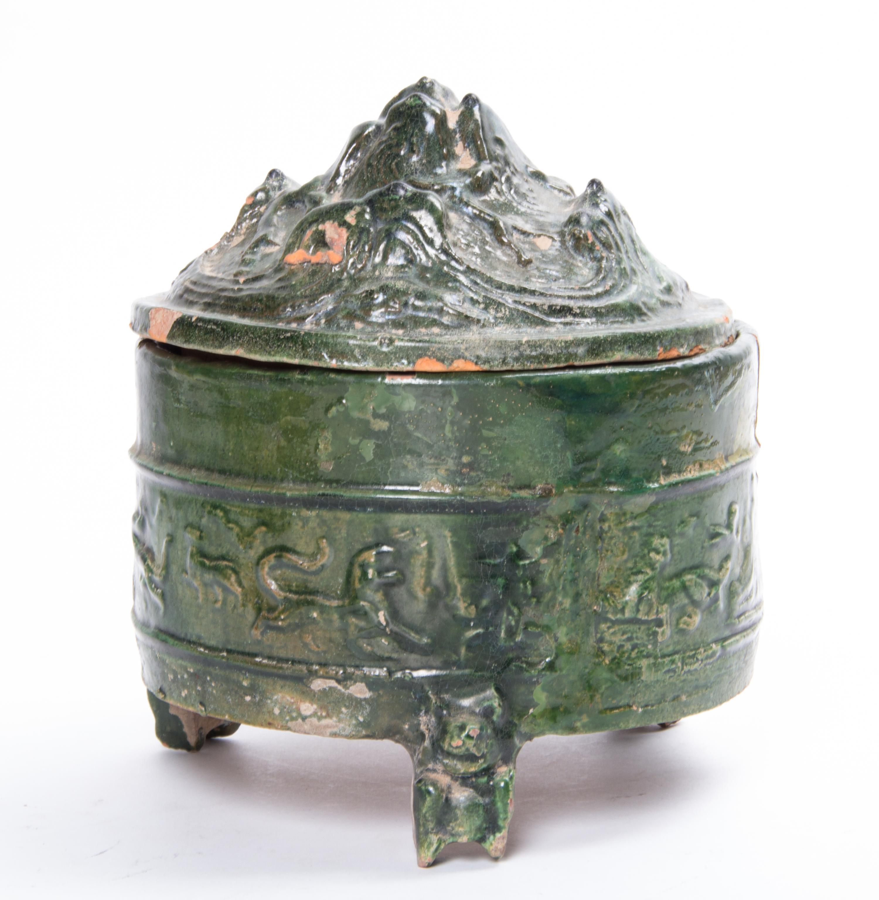 A Green Glazed Terra Cotta Vessel Diameter 7 3/4 inches.